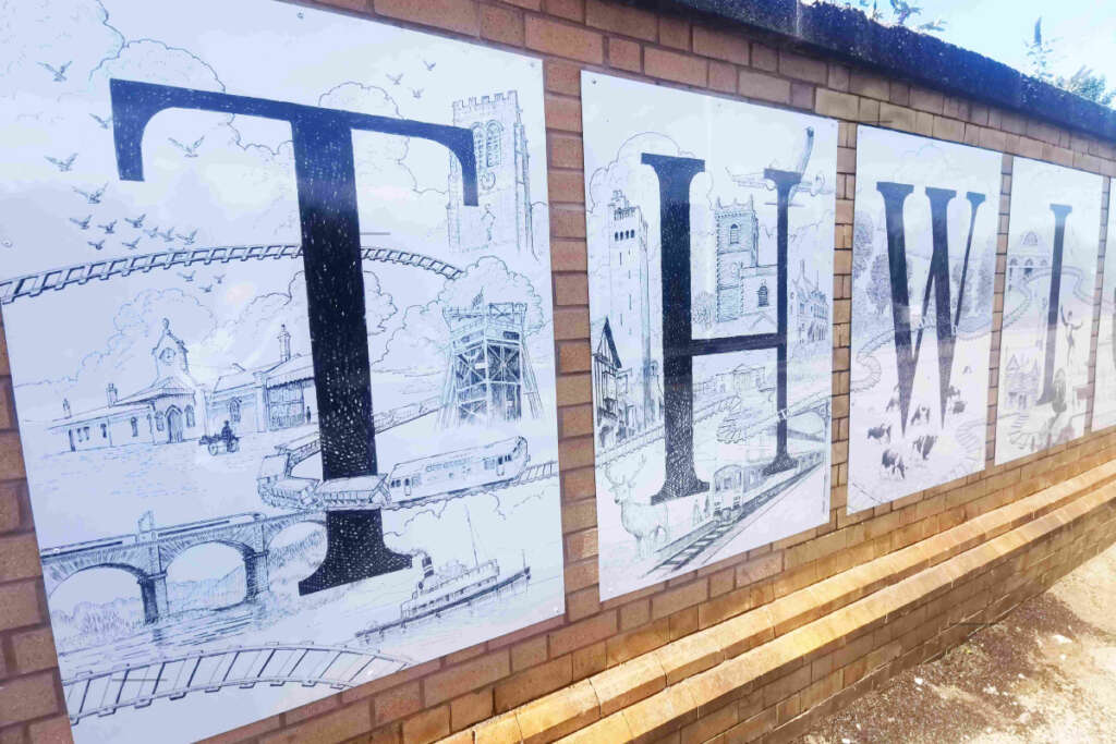 Dibond signs at Northwich Railway Station featuring our Outdoor Signage alupanels. Johnsons Printers